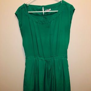 A green knee length dress